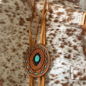 Allie Falcon custom leather bolo